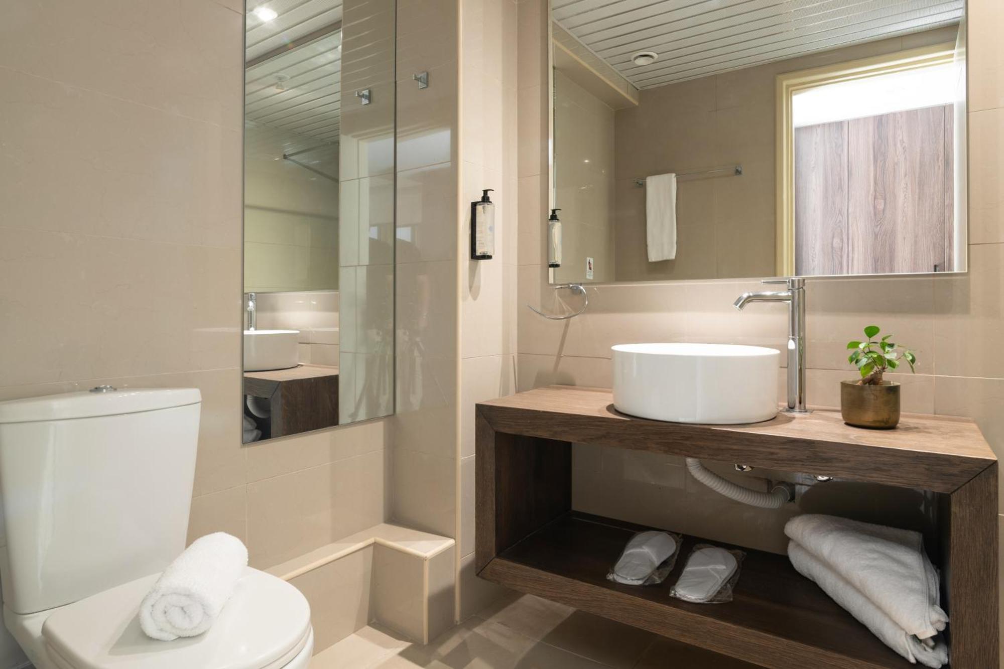 Planos Deluxe Hotel Bilik gambar