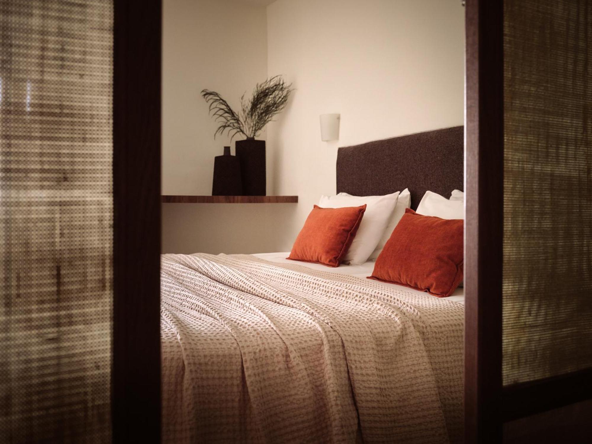 Planos Deluxe Hotel Bilik gambar