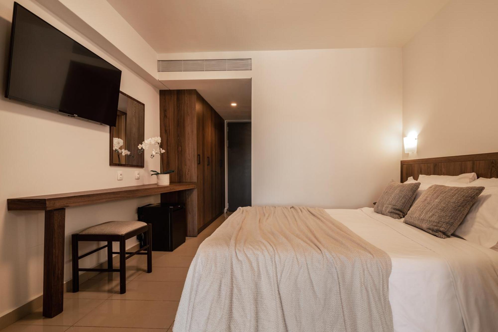 Planos Deluxe Hotel Bilik gambar