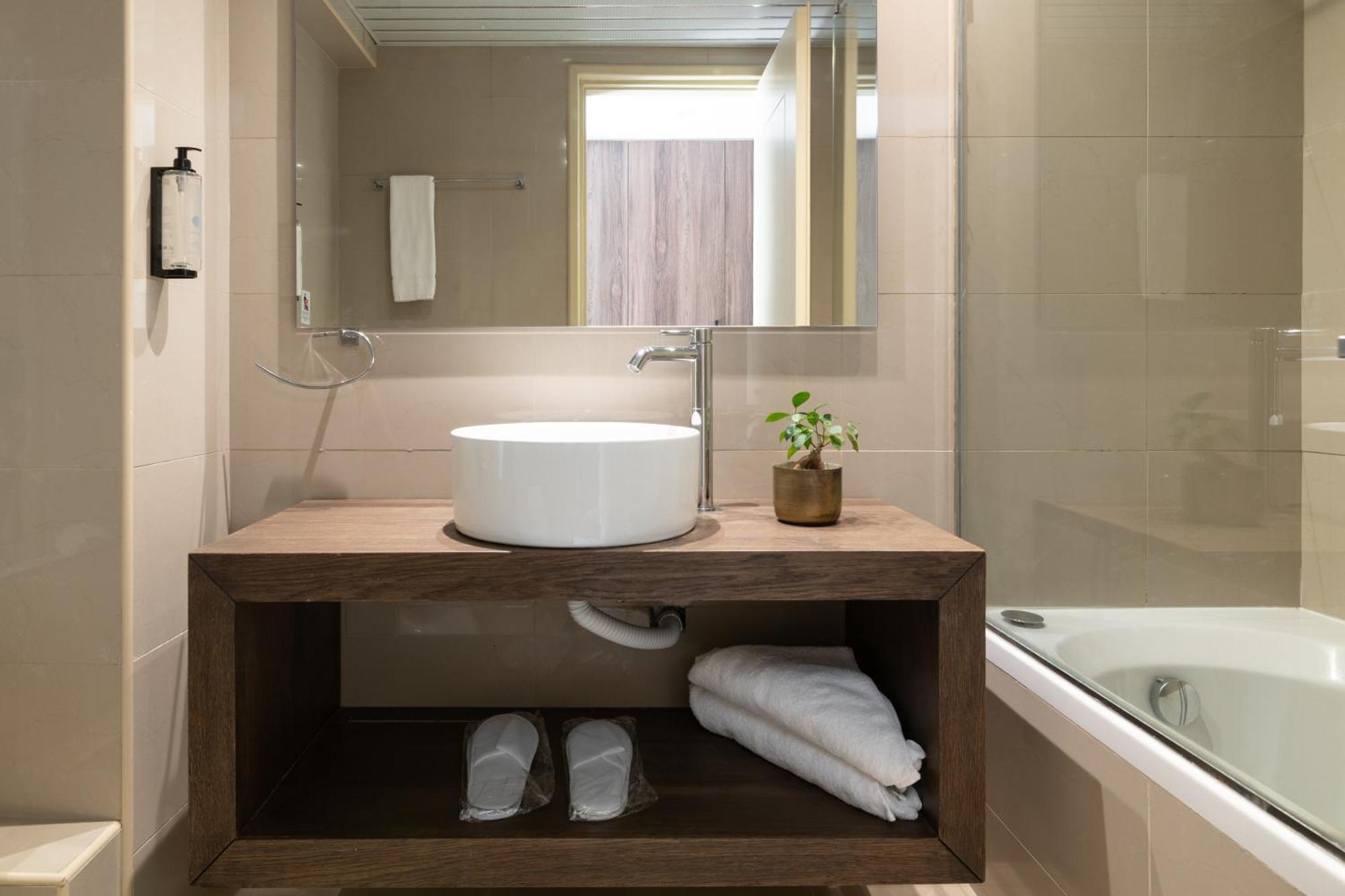 Planos Deluxe Hotel Bilik gambar
