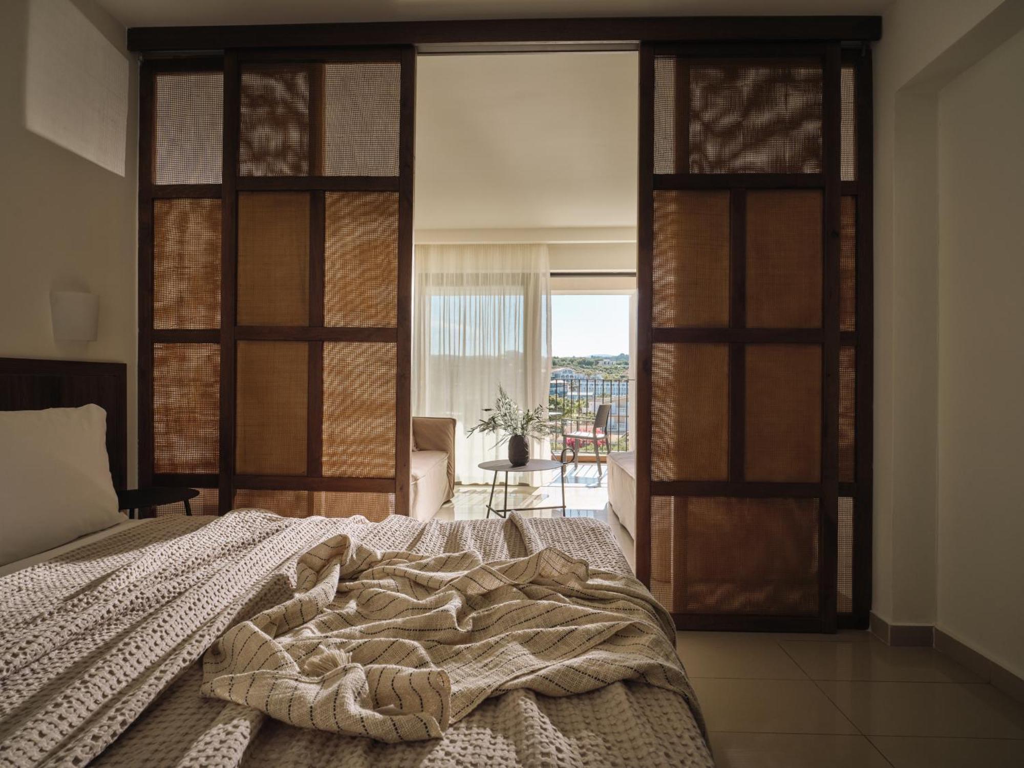 Planos Deluxe Hotel Bilik gambar